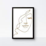 Handcrafted woman face string art with light background and black frame.
