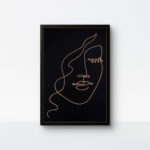 Minimalist woman face string art with black background and black frame by Upahar18.