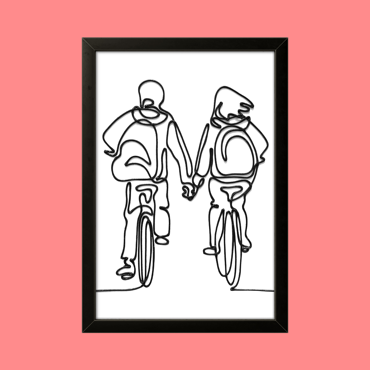 A handcrafted rope line art of a couple cycling together, framed in black, with a pink background.