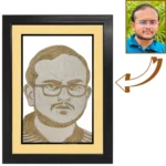 A customized professional male face rope craft portrait with spectacles and a mustache, shown with a reference arrow coming from his real photo, presented in a premium matted black frame.