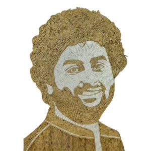 A portrait cutout of singer Arijit Singh handmade with textured brown jute for his curly hair and signature beard, contrasted with white threads on a clean white background.