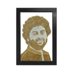 A creative rope craft portrait of singer Arijit Singh made with textured jute and white threads, enclosed in a sleek, minimalistic black rectangular frame against a white background.