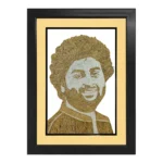 An elegant rope craft portrait of Arijit Singh intricately designed with natural brown and off-white ropes, presented in a premium black frame with a soft cream-colored inner border mount.