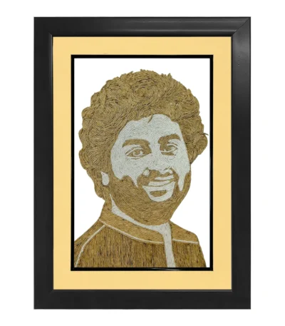 An elegant rope craft portrait of Arijit Singh intricately designed with natural brown and off-white ropes, presented in a premium black frame with a soft cream-colored inner border mount.