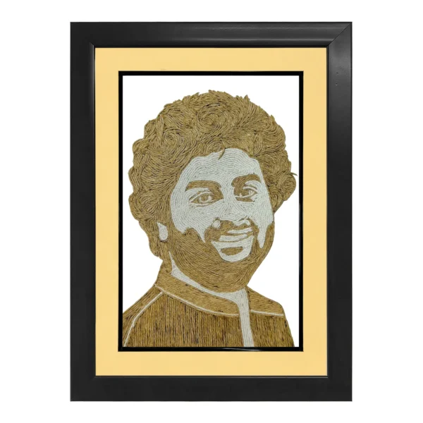 An elegant rope craft portrait of Arijit Singh intricately designed with natural brown and off-white ropes, presented in a premium black frame with a soft cream-colored inner border mount.