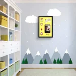 Upahar18 personalized baby birth details classic photo frame design 009 hanging on a light blue nursery wall with mountain and cloud wall stickers