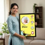 A smiling woman holding a personalized baby birth details classic photo frame design 010 by upahar18 inside a beautifully decorated home living room