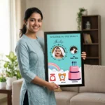A smiling woman holding a personalized baby birth details classic photo frame design 013 by upahar18 inside a beautifully decorated home living room