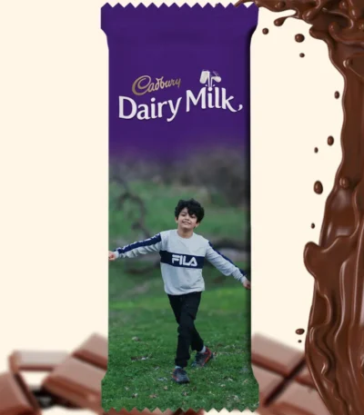 A customized Cadbury Dairy Milk bar wrapper by upahar18, showcasing a large personalized photo printed image of a boy playing outdoors across the entire lower half.
