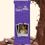 An elegant purple floral patterned customized Cadbury Dairy Milk wrapper from upahar18, featuring a personalized photo printed in a retro Polaroid style.