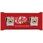 A horizontal red customized kitkat wrapper template by upahar18 featuring two separate empty polaroid photo frames pinned to the wrapper.