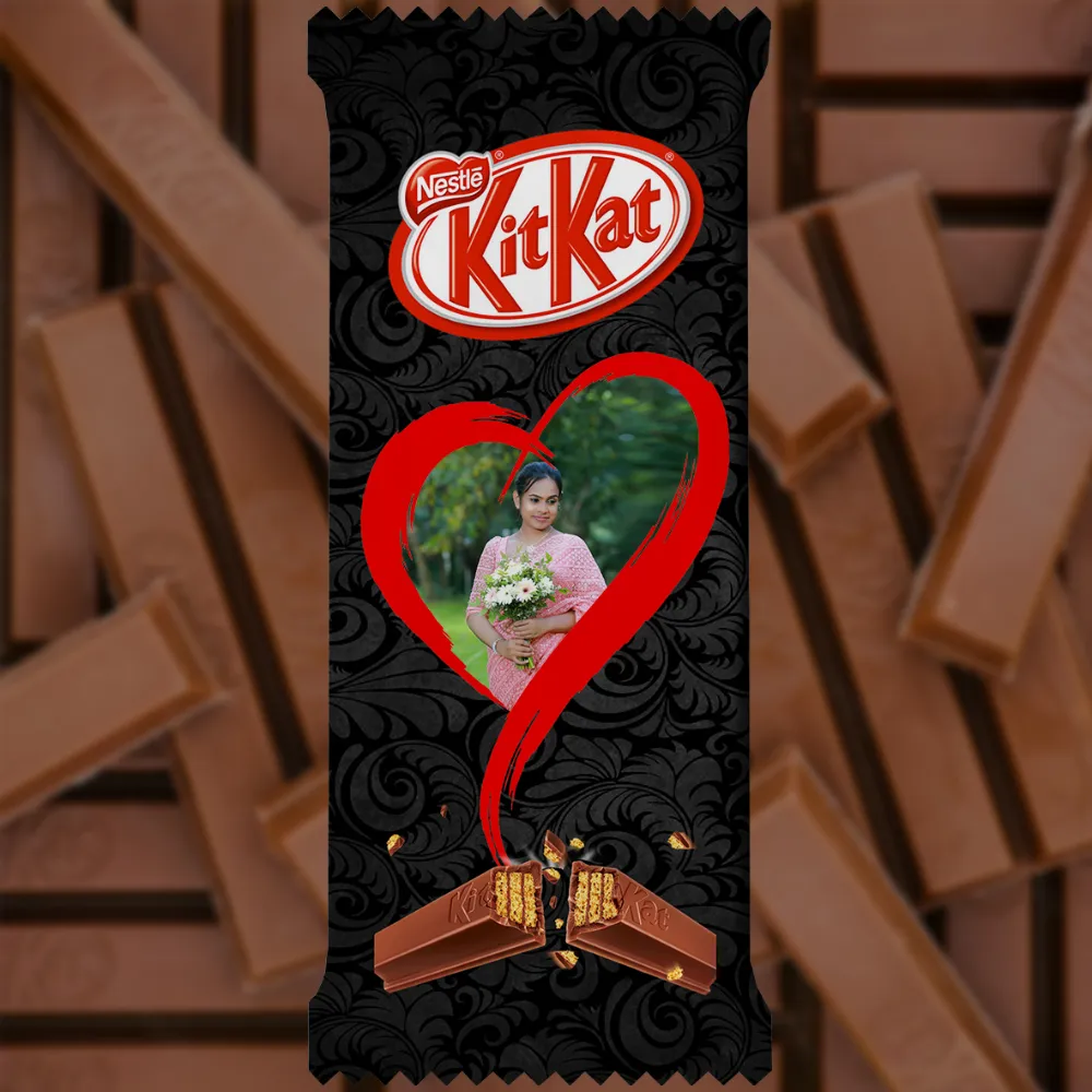 An elegant black swirl patterned upahar18 customized kitkat chocolate wrapper, featuring a personalized photo printed image inside a large red brush-stroke heart frame.