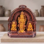 Authentic dark-bordered Terracotta Maa Kali idol by upahar18 placed elegantly on a wooden display block inside an interior studio setting, crafted in Krishnanagar.