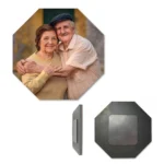 A product presentation image of an eight-sided octagon-shaped custom MDF photo fridge magnet, featuring a personalized picture of an elderly couple smiling and hugging. The display includes a slim side-view perspective and a separate back-view image showing the dark matte-finished wooden octagon base with a silver-grey square magnet in the middle by upahar18.