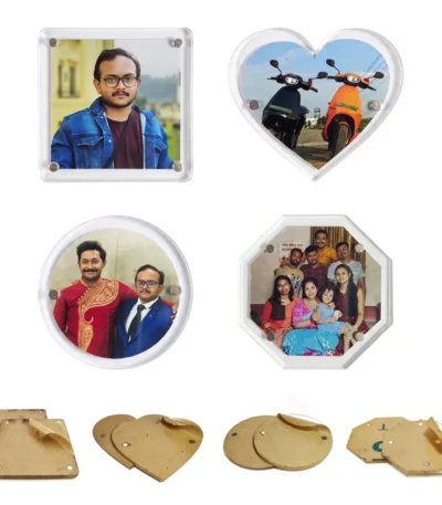 Acrylic Fridge Magnets Multi-Shape Combo (Set of 4 Pieces) Detailed Alt Text: A product display on a plain white background showing a combo set of four different shaped transparent acrylic magnetic photo frames, arranged in a grid, including a square frame with a man in a denim jacket, a heart frame with two electric scooters, a round frame with two men in traditional and formal wear, and an octagon frame with a family group photo. Directly below each assembled frame, their respective matching unpeeled brown protective kraft paper layers and extra clear panels are displayed by upahar18.