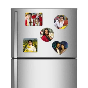 A straight front view of a metallic double-door refrigerator holding a complete combo pack of five different shaped personalized flexible photo printed fridge magnets, which includes a landscape rectangle magnet featuring a traditional Indian bride and groom, an octagon magnet, a center round magnet, a square magnet in a mustard field, and a heart-shaped couple magnet, all showcasing customized high-definition photos by upahar18.