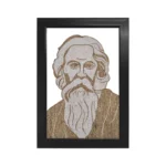 Upahar18 Rabindranath Thakur Rope Craft Portrait Frame encased in a solid black rectangular border displaying a handmade full face portrait of Gurudev with his iconic robes.