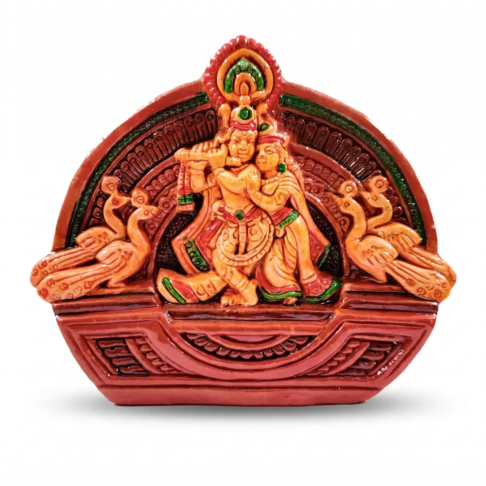 Premium upahar18 handcrafted colored Terracotta Radha Krishna idol with peacock motifs, crafted by traditional clay artisans of Krishnanagar.