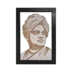 Upahar18 Swami Vivekananda Rope Craft Portrait Frame in a black rectangular border showcasing the handmade three-quarter profile portrait of Swamiji with his intense eyes.
