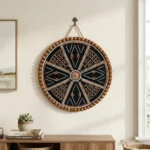 Ethnic style room interior featuring the Wooden Bead and Natural Seed Mandala Handcrafted Round Wall Decor hung above a console table with books and a succulent.