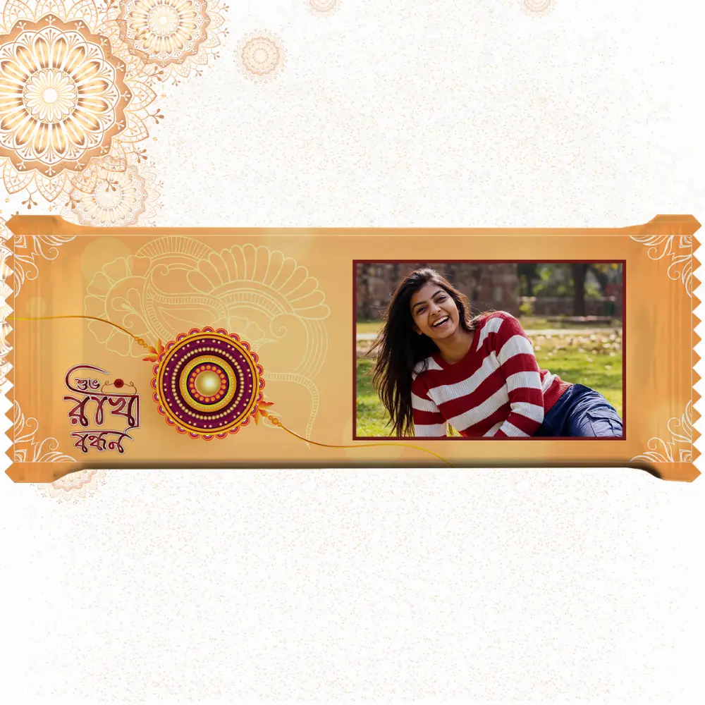 Horizontal custom Cadbury Dairy Milk by upahar18 featuring a golden rakhi theme customize design wrapper with a beautiful photo chocolate print of a smiling girl in a striped sweater.