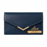 A clean front-facing studio shot of a closed deep blue faux Leather Wallet from upahar18 against a plain white background, highlighting a personalized gold V-shaped metal trim, a cursive 'Love' charm, and a custom name plate printed with PRIYA, offering a premium style similar to a custom men Wallet.
