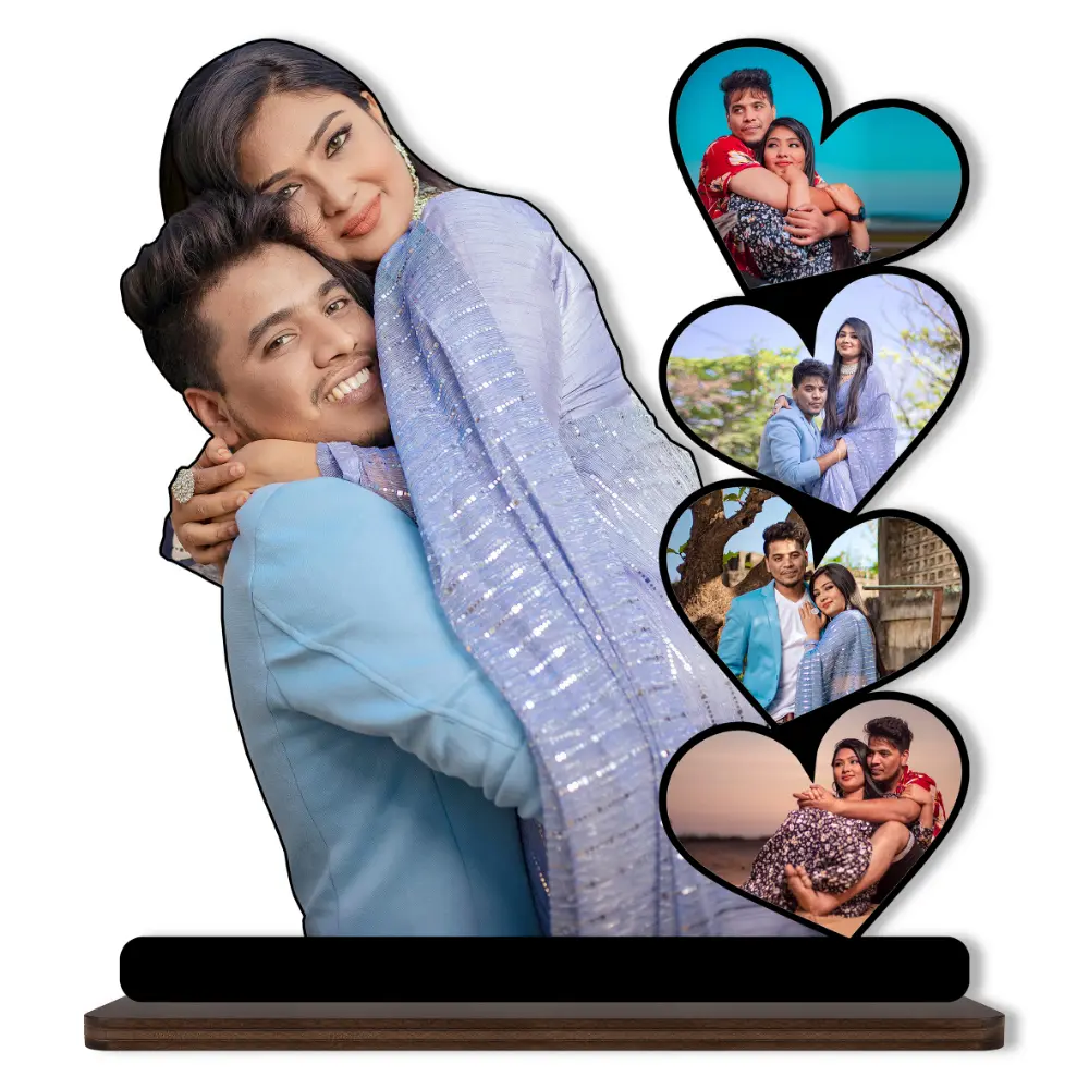 A high-definition printed MDF cutout standee by upahar18 featuring a personalized custom photo collage with a large main cutout of a hugging couple alongside four heart-shaped photo slots, isolated on a white background.