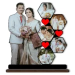 A high-definition personalized custom photo printed MDF cutout standee from upahar18 showcasing a multi-photo hexagon collage of a married couple with red heart details, isolated on a clean white background.
