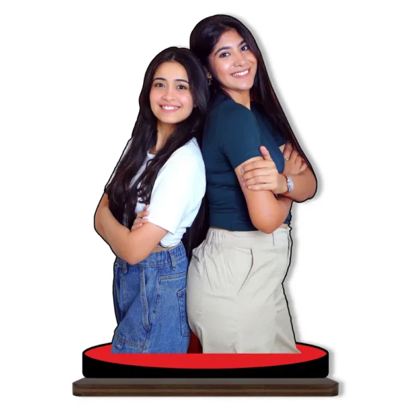 A personalized custom photo printed MDF cutout standee from upahar18 showcasing two smiling female friends standing back-to-back with arms crossed, isolated on a plain white background.