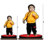 A size comparison diagram showcasing the upahar18 personalized custom photo printed MDF cutout standee in 8 inch and 12 inch options, featuring a sweet baby boy theme to help pick the perfect scaling size.