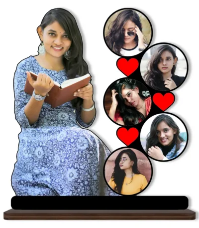 A high-definition printed MDF cutout standee by upahar18 featuring a personalized custom photo collage with a main silhouette cutout of a girl reading a book alongside five round portrait bubbles decorated with red hearts, isolated on a white background.