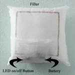 An internal component diagram showing the square cushion filler mechanism with labeled battery slot and LED on/off button from upahar18.