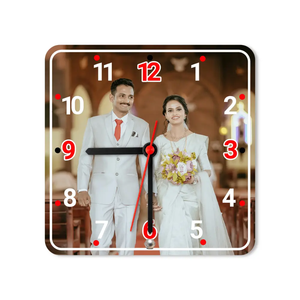 A studio front view of a square upahar18 Table clock cleanly printed with a high-resolution custom photo layout of a wedding couple, isolated on a solid white background.