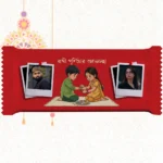 Horizontal red custom Nestlé KitKat bar by upahar18 with a customize design wrapper featuring Bengali text, sibling art, and dual Polaroid photo chocolate prints of a brother on the left and a sister on the right.