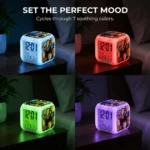 A 4-quadrant grid graphic showing the Upahar18 personalized photo printed led alarm clock glowing on a dark wooden nightstand under different lighting environments. The top-left quadrant shows the clock glowing in a bright cyan blue light; the top-right glows in a warm crimson red light; the bottom-left illuminates the nightstand with a soft neon green glow; and the bottom-right shines in a deep purple light. The bold white header text at the top reads 'SET THE PERFECT MOOD' followed by the subheading 'Cycles through 7 soothing colors.' The side-printed family photo glows beautifully under every light color.