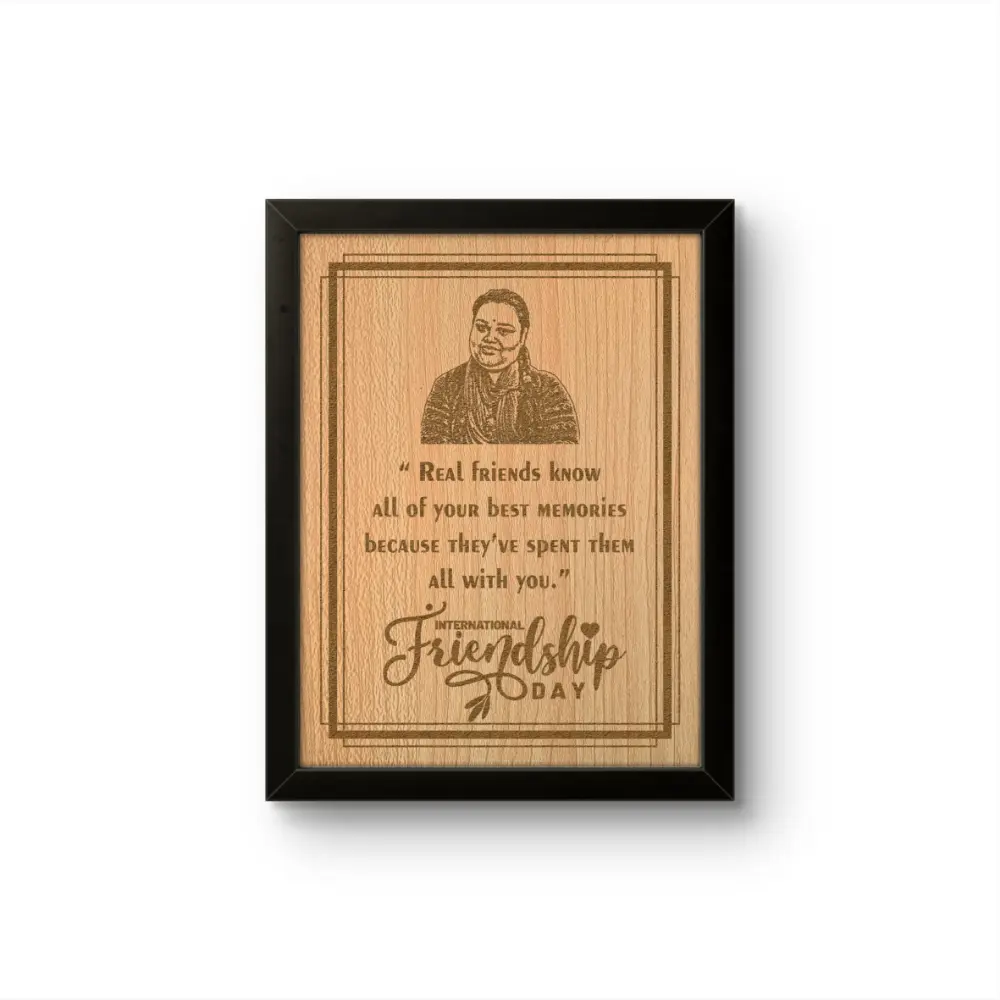 A custom engraved frame made of natural wood grain finish MDF by upahar18, featuring a personalized engraved portrait sketch of a friend, a touching friendship quote, and an 'International Friendship Day' wish within a sleek black border.