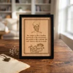 An upahar18 personalized custom engraved frame for Teacher's Day placed elegantly on a rustic wooden table in a well-lit cozy room, displaying the premium wood engraving finish of the MDF memento plaque.